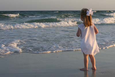 Child looking out into Gulf