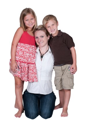 Single mom with her son and daughter by her side