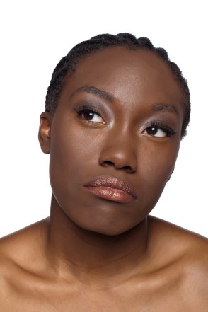 Black woman contemplating