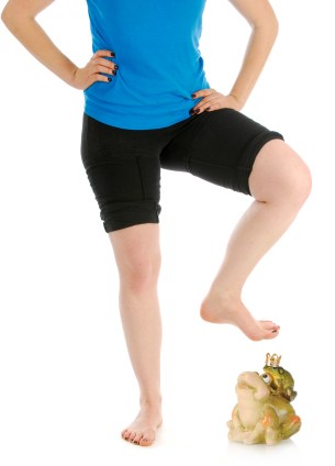 Woman about to stomp on frog prince