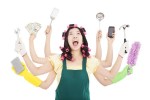 Young woman with curlers and eight arms holding household tools