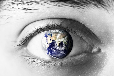 Eye with world globe as iris